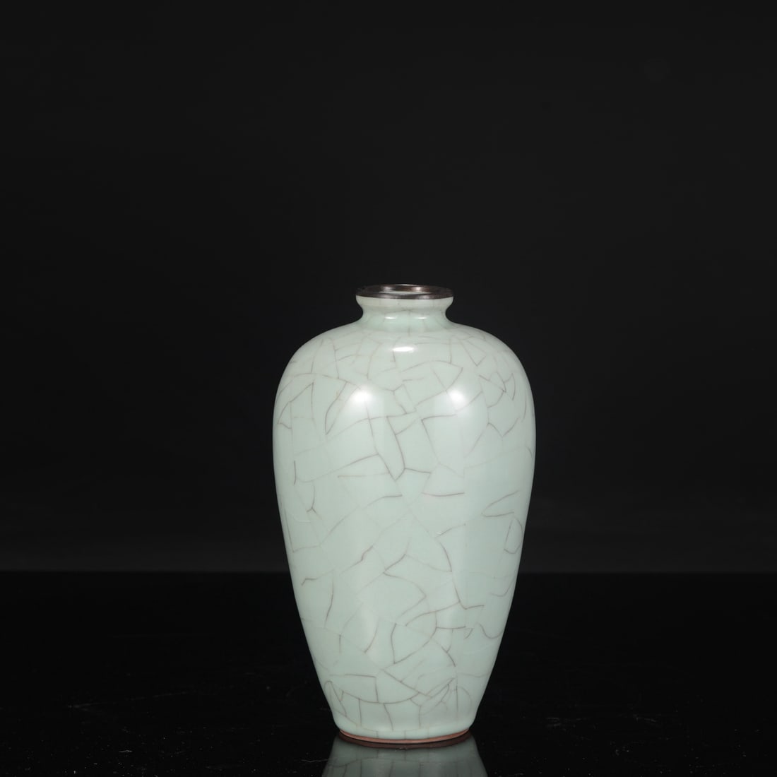 A large Southern Song Dynasty official kiln celadon plum vase with a silver rim, formerly in the: Height: 22 cm, Mouth diameter: 4.5 cm, Belly diameter: 12 cm