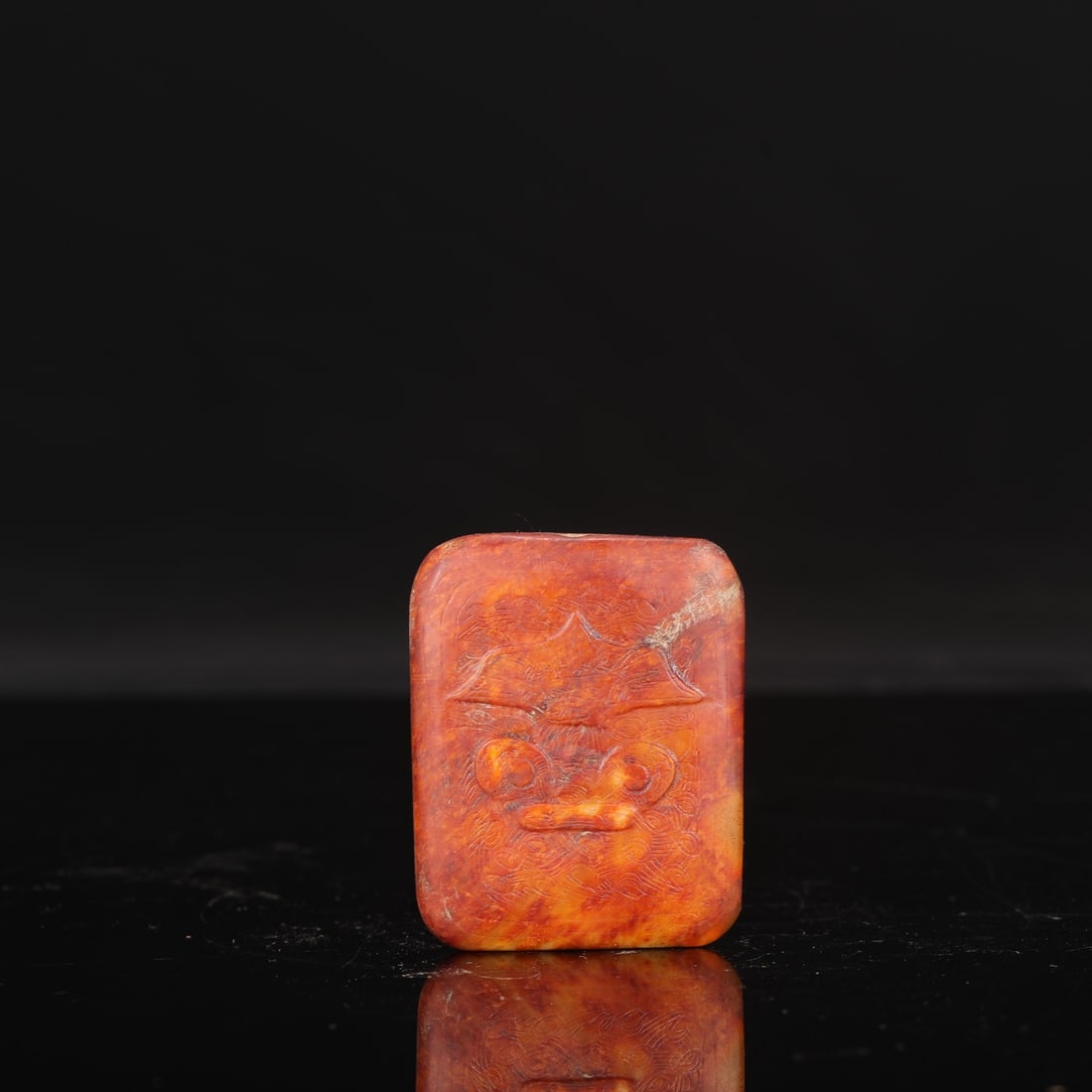 The Liangzhu culture jade pendant with animal mask design, formerly in the collection.: Length: 7.5 cm, Width: 6.5 cm