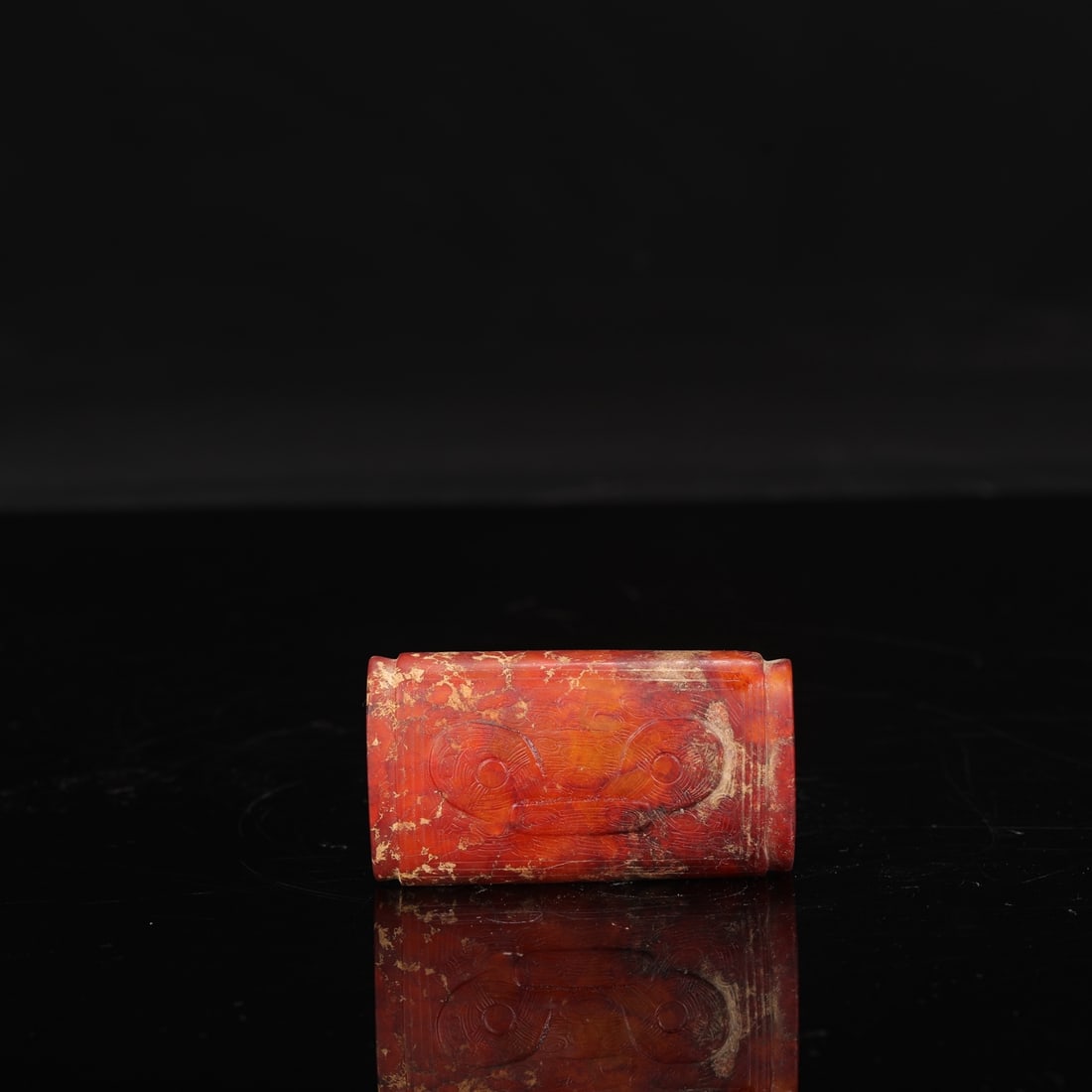 The dimensions of the Liangzhu Culture jade tube with animal mask design (formerly in the: Length: 8 cm, Width: 5 cm