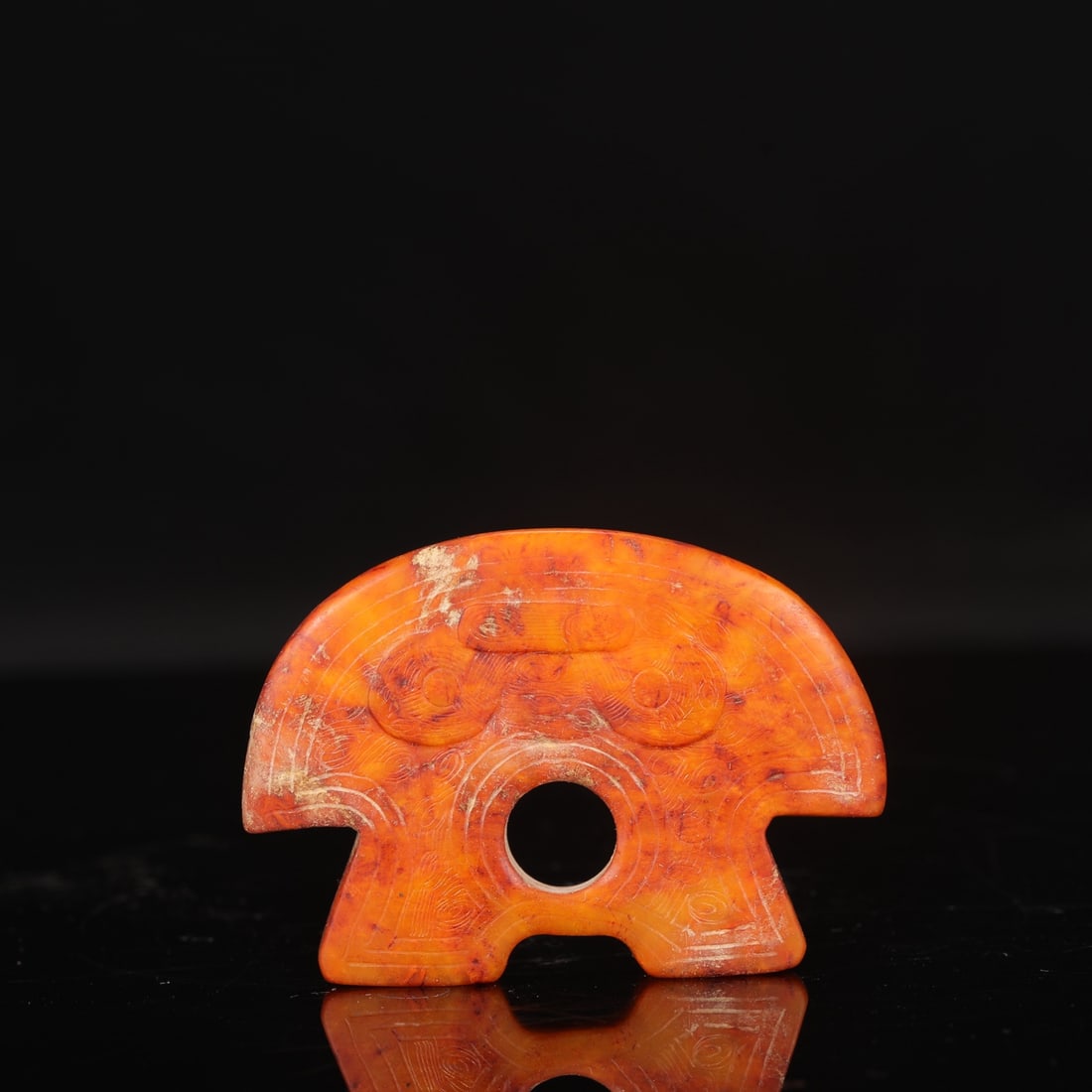 The Liangzhu Culture jade crown-shaped artifact with animal mask design, formerly in the collection.: Length: 9.3 cm, Width: 7 cm