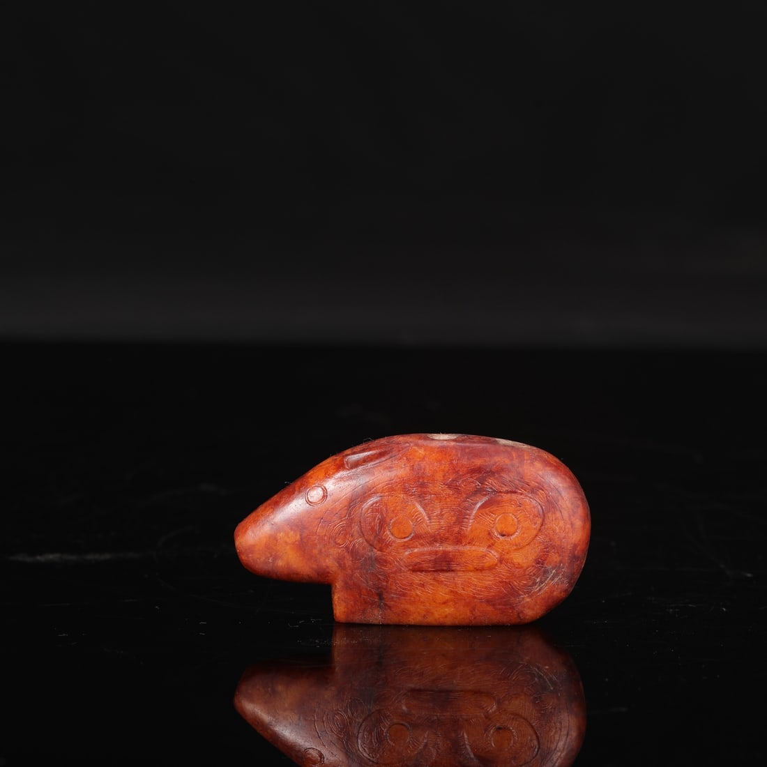 Jade beast with animal mask design from the Liangzhu culture (formerly in the collection).: Length: 8.5 cm, Width: 4.5 cm