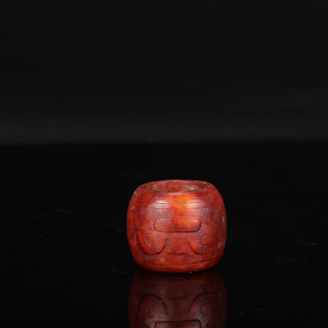 A jade cong-shaped thumb ring with animal mask design from the Liangzhu culture, formerly in the: Height: 4.5 cm, Diameter: 3 cm