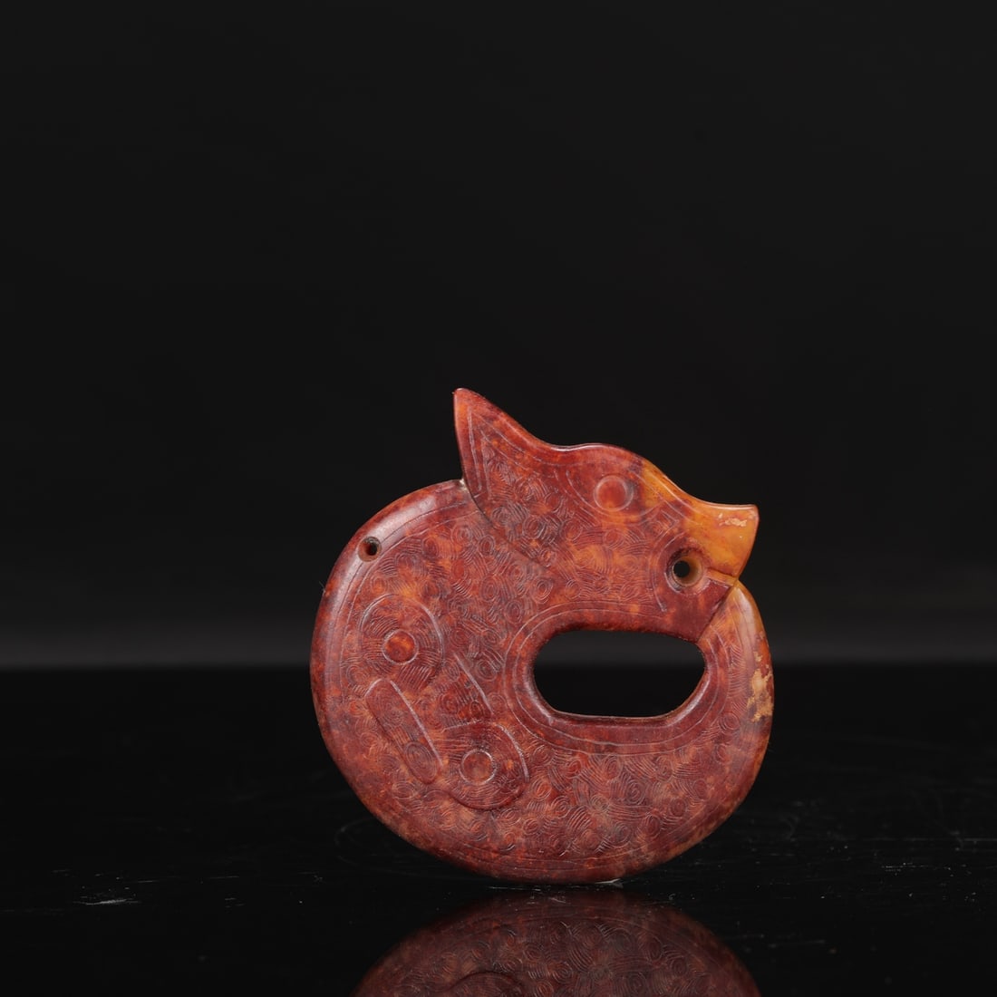 Large jade ring in the shape of a dragon from the Liangzhu culture (formerly in the collection).: Diameter: 10 cm