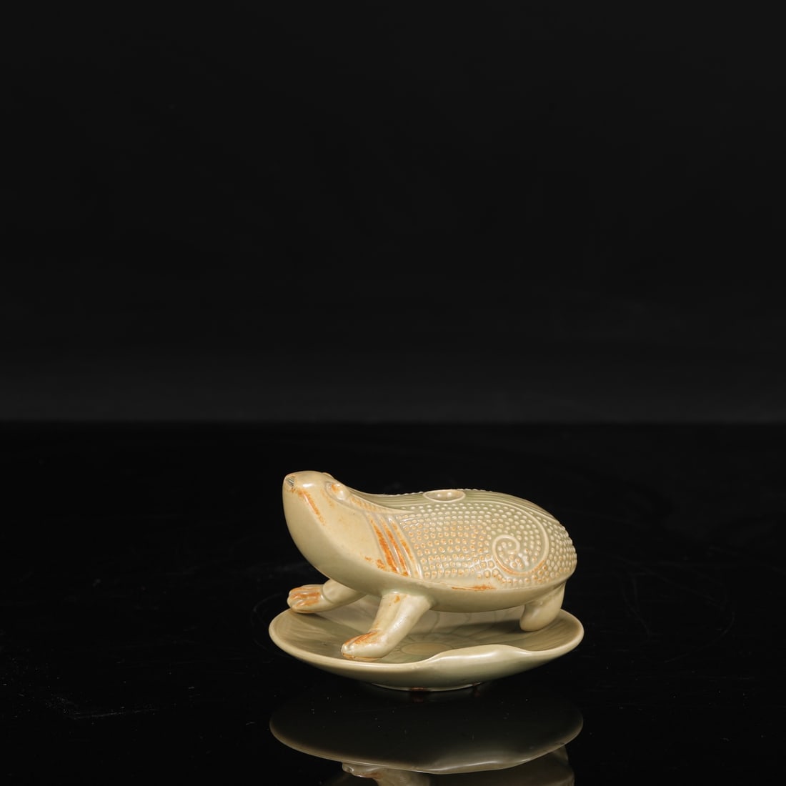 A set of Tang Dynasty Yue ware celadon toad stands, formerly in the collection. (1 of 8)