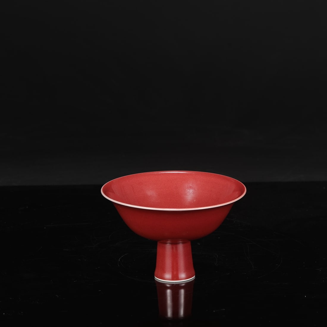 A Ming Dynasty Xuande period gem-red glazed stem bowl.: Height: 10 cm, Diameter: 15 cm