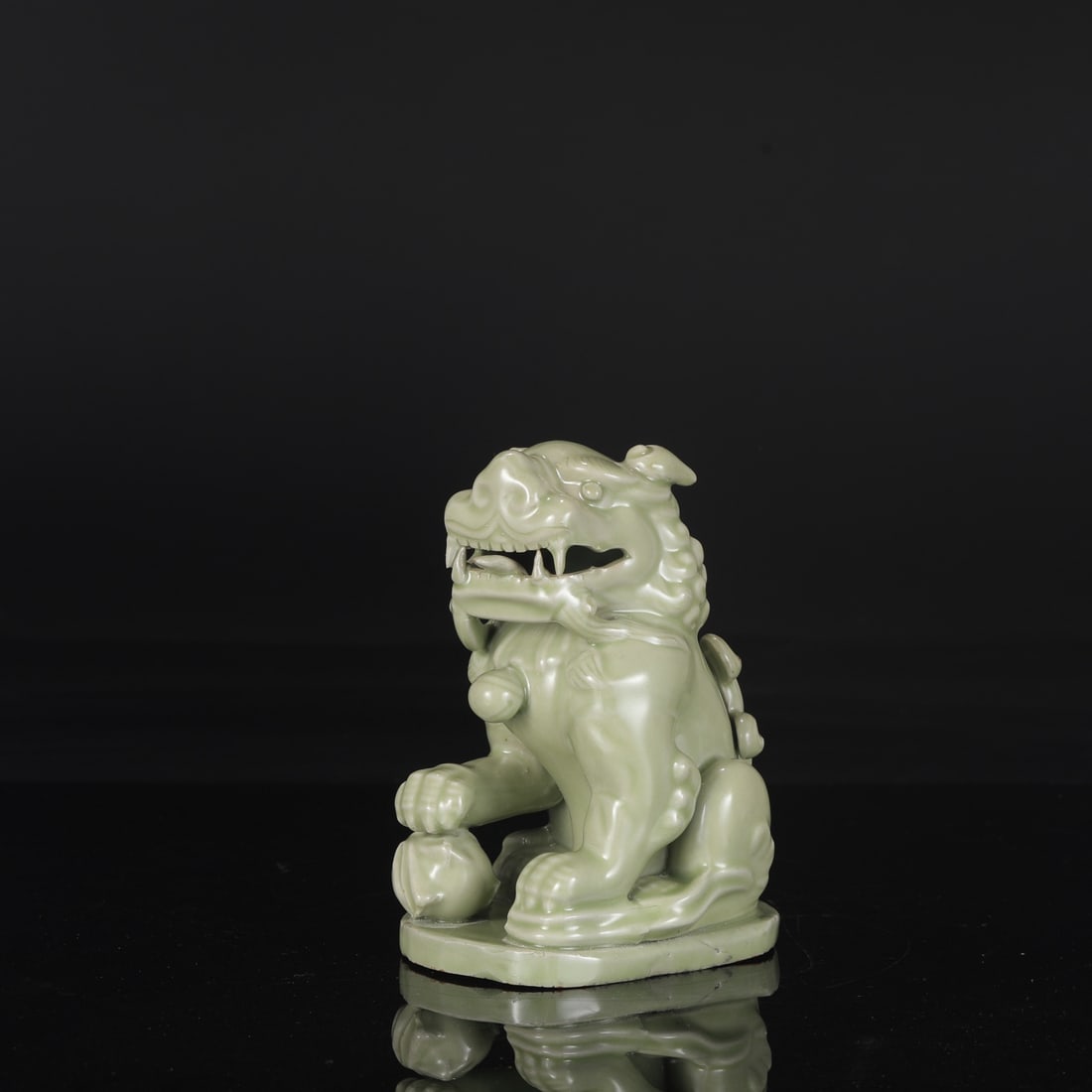 The Tang Dynasty Yue ware celadon lion-shaped beast, formerly in the collection. (1 of 7)