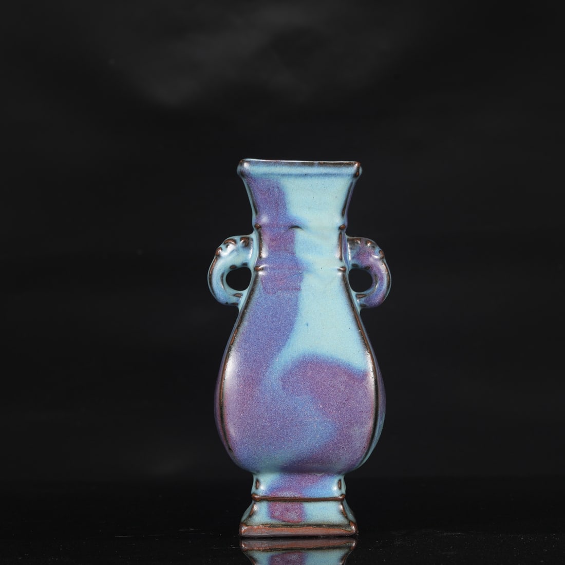 A Northern Song Dynasty Jun ware vase with purple-red spots and elephant-ear handles, bearing an: Height: 23 cm, Mouth diameter: 7.5 cm, Belly diameter: 9 cm
