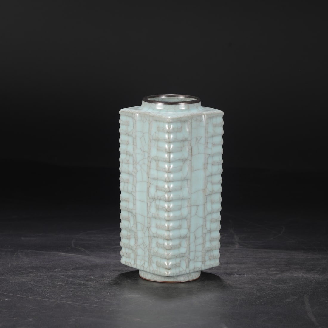 A Southern Song Dynasty official kiln celadon vase with a silver mouth and cong-shaped inscription,: Height: 23 cm, Mouth Diameter: 7 cm, Belly Diameter: 9 cm