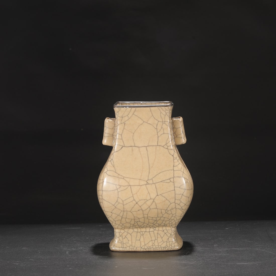 A large, square-shaped vase with a beige-colored glaze and silver mouth, formerly in the collection: Height: 24.5 cm, Mouth diameter: 10 cm, Belly diameter: 15.5 cm