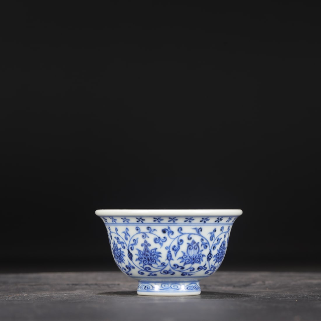 A Ming Dynasty Yongle period blue and white porcelain cup with lotus scroll design, formerly in the: Height: 5.5 cm, Mouth Diameter: 9 cm