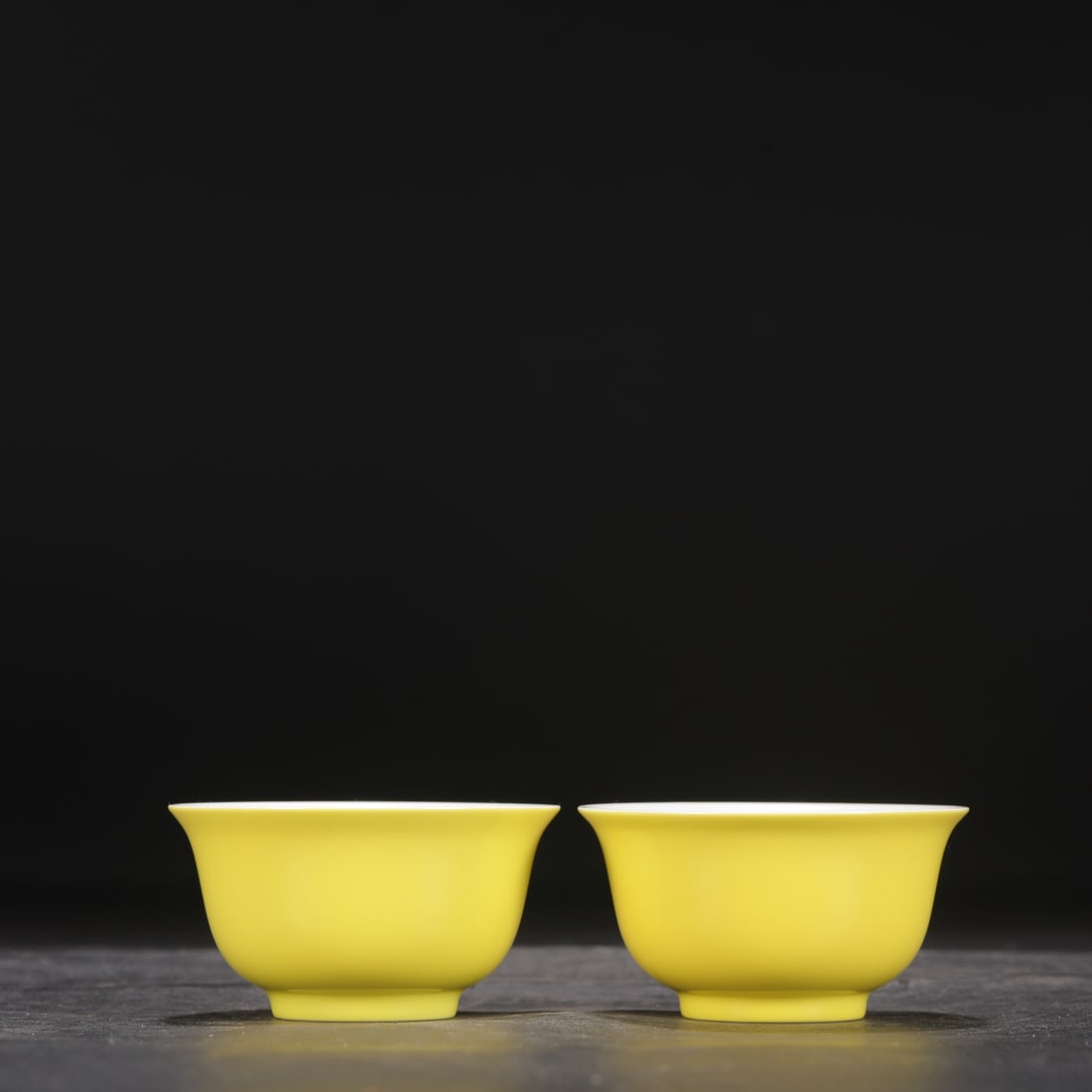 A pair of Qing Dynasty Yongzheng period pale yellow glazed tea bowls, formerly in my collection.: Height: 4.5 cm, Mouth Diameter: 8.5 cm