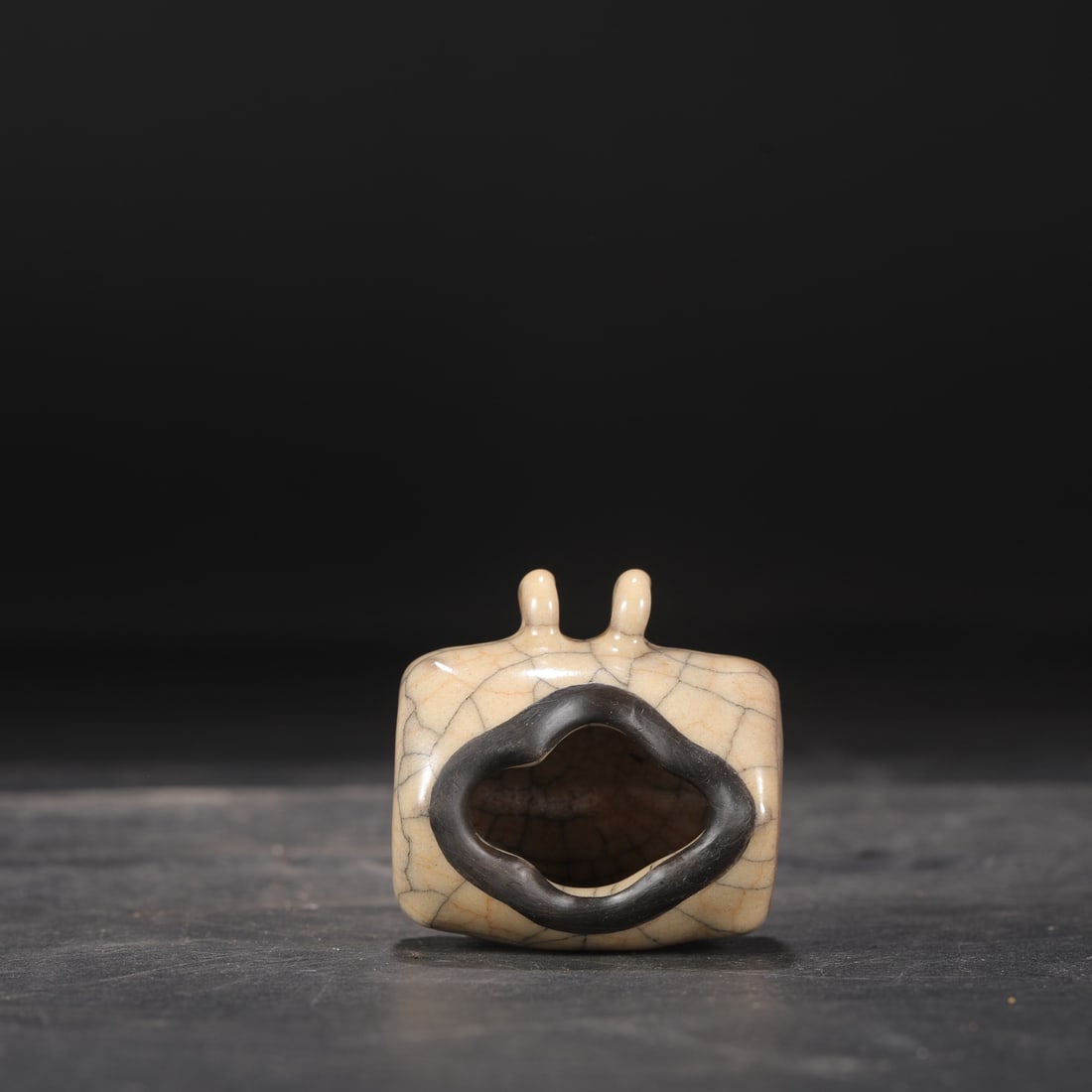 A Northern Song Dynasty Ge ware bird feeder with a beige glaze and silver rim, formerly in the: Dimensions: Height 4.5 cm, Mouth Diameter 3.3 cm.
