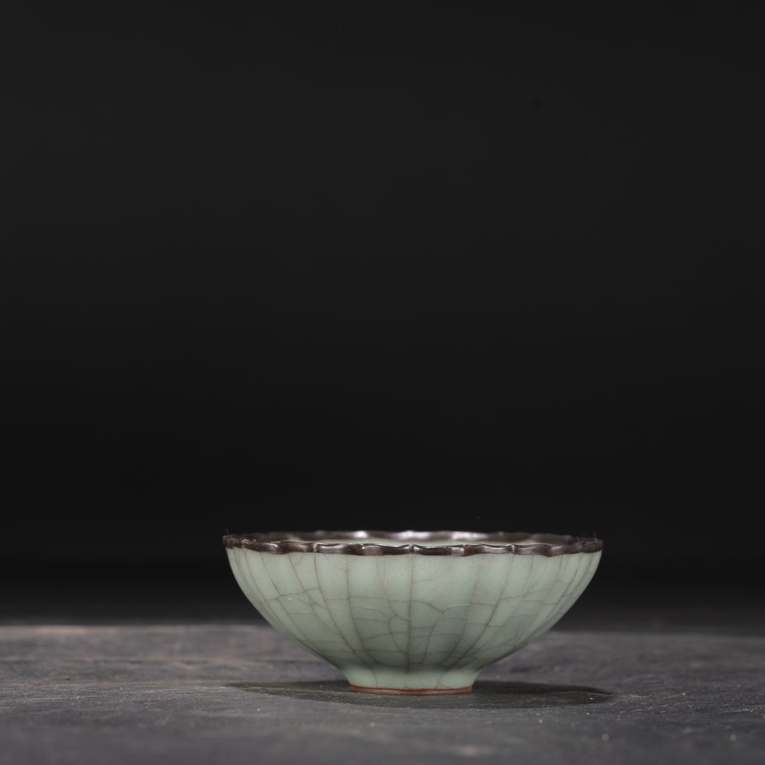 A Southern Song Dynasty official kiln celadon tea bowl with a silver rim, formerly in my collection, (1 of 7)