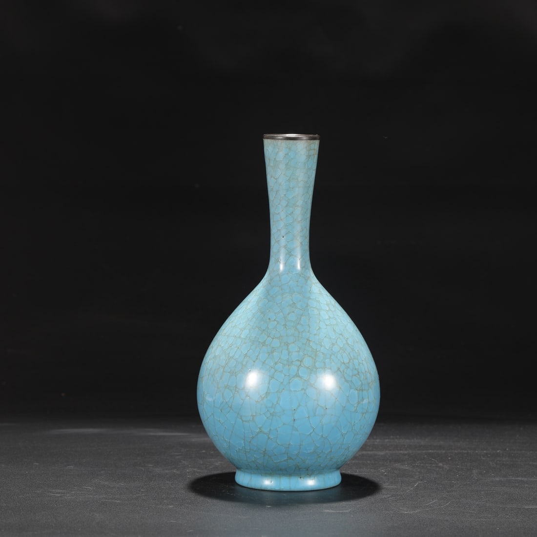 A Northern Song Dynasty Ru ware sky-blue glazed vase with ice-crack pattern and silver rim, formerly: Dimensions: Height 27 cm, Mouth diameter 4 cm, Belly diameter 13 cm.