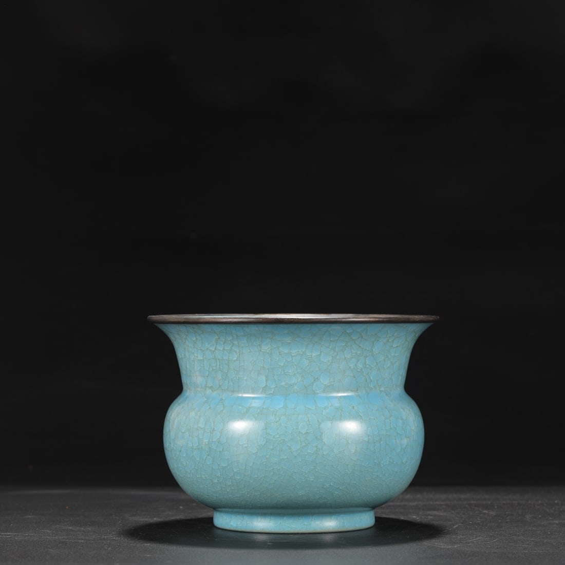 A Northern Song Dynasty Ru ware sky-blue glazed, ice-crack patterned, silver-rimmed imperial (1 of 8)