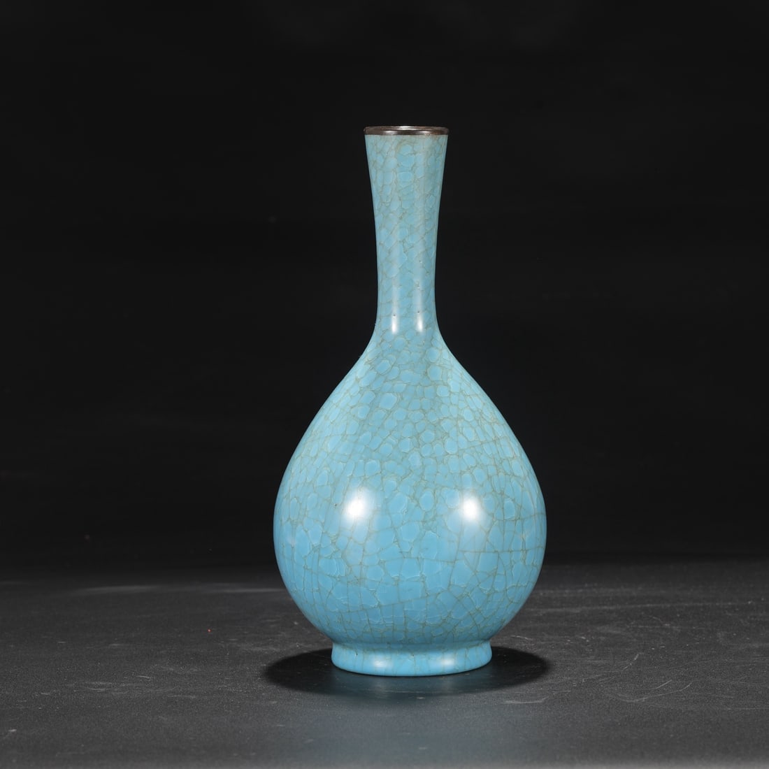 A Northern Song Dynasty Ru ware sky-blue glazed vase with ice-crack pattern and silver rim, formerly: Dimensions: Height 27 cm, Mouth diameter 4 cm, Belly diameter 13 cm.