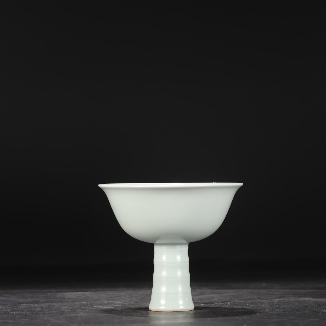 A Yuan Dynasty Shufu kiln egg-white glazed stem bowl with incised cloud and dragon design, formerly: Dimensions: Height 11 cm, Mouth Diameter 12 cm