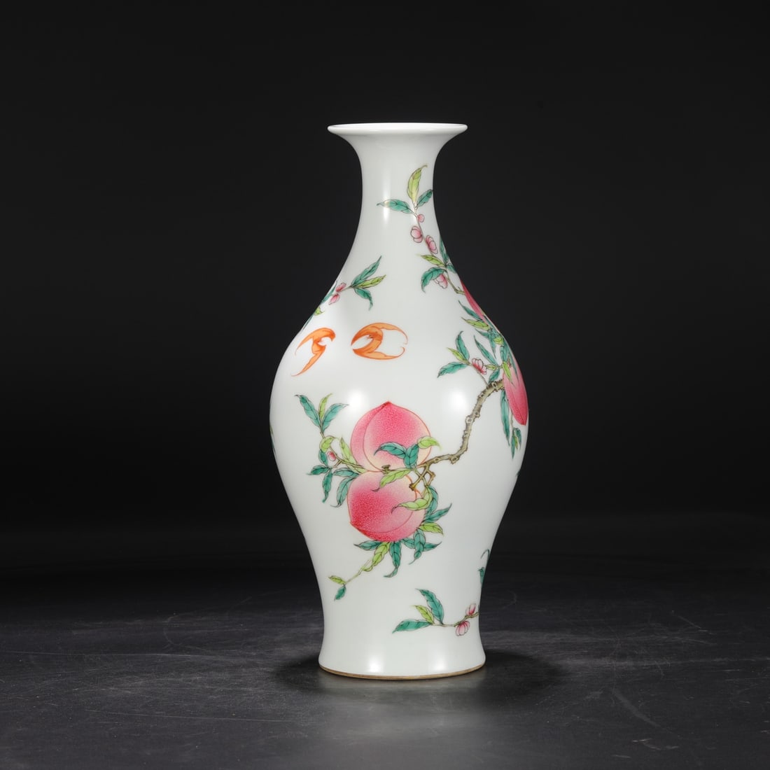 A large olive-shaped vase with famille rose decoration of longevity and auspicious branches from the: Dimensions: Height 40 cm, Mouth diameter 10 cm, Belly diameter 18 cm.