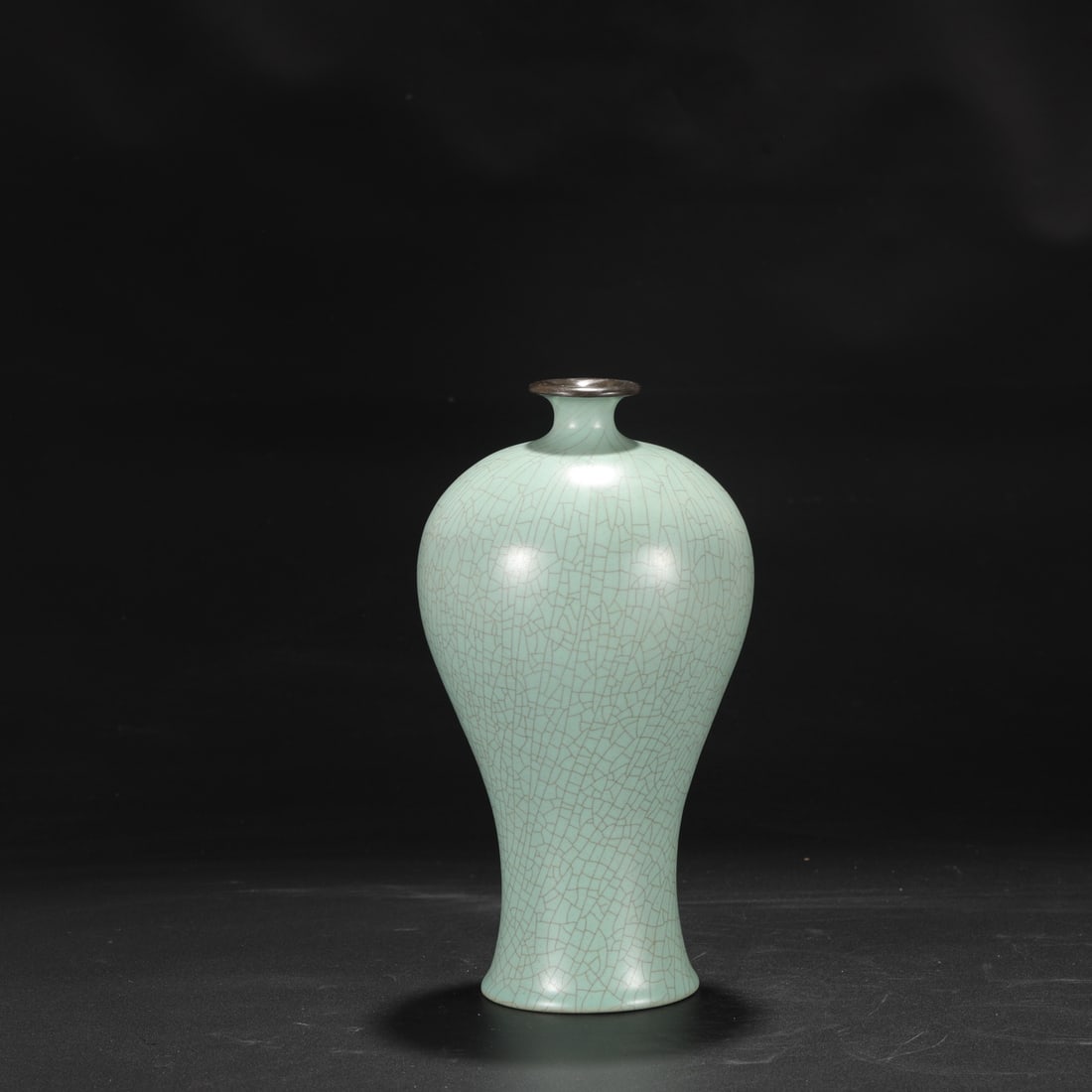 A large Northern Song Dynasty Ru ware celadon-glazed plum vase with a silver rim, formerly in the: Dimensions: Height 23.5 cm, Mouth diameter 5 cm, Belly diameter 13.5 cm.