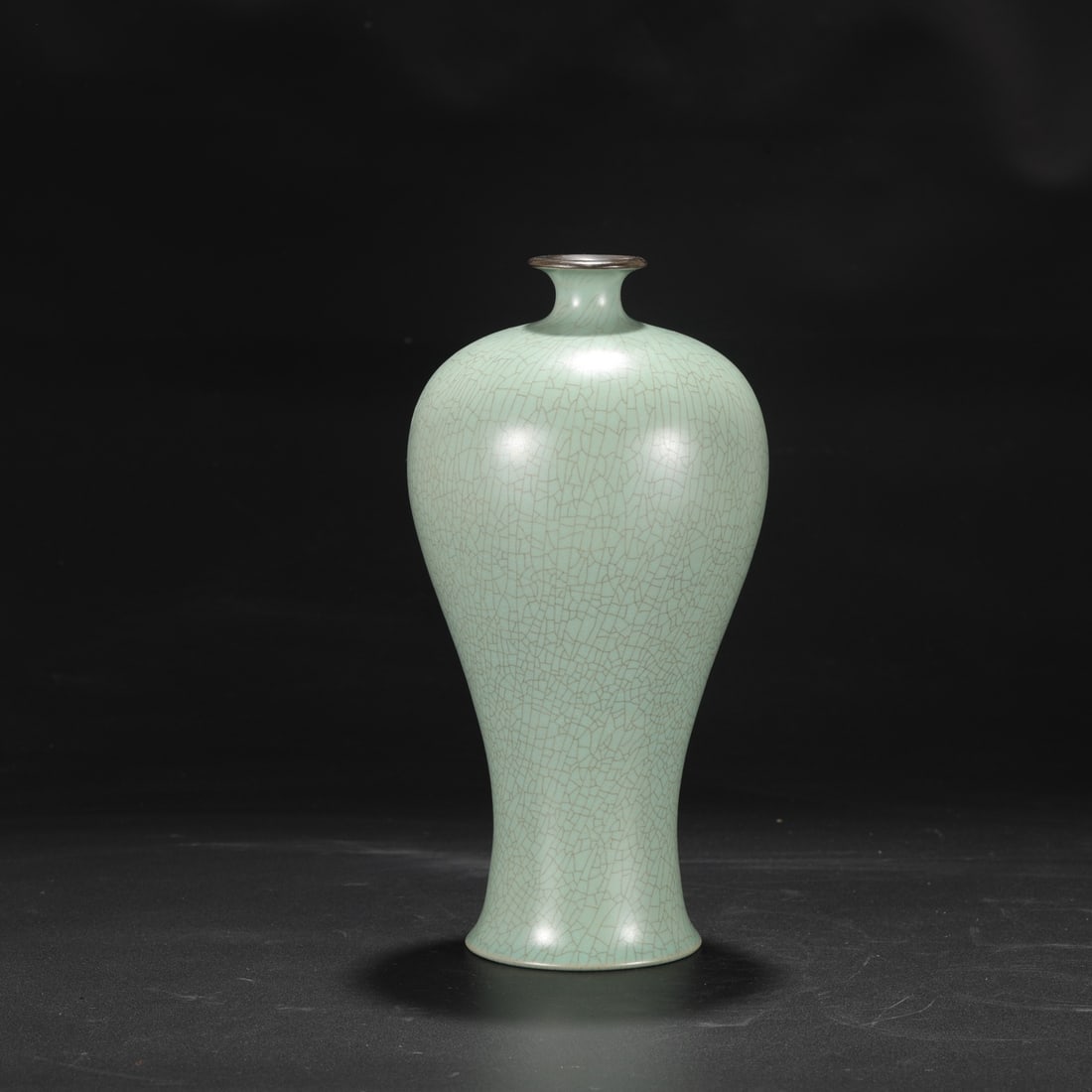 A large Northern Song Dynasty Ru ware celadon-glazed plum vase with a silver rim, formerly in the: Dimensions: Height 29 cm, Mouth diameter 5 cm, Belly diameter 14 cm.