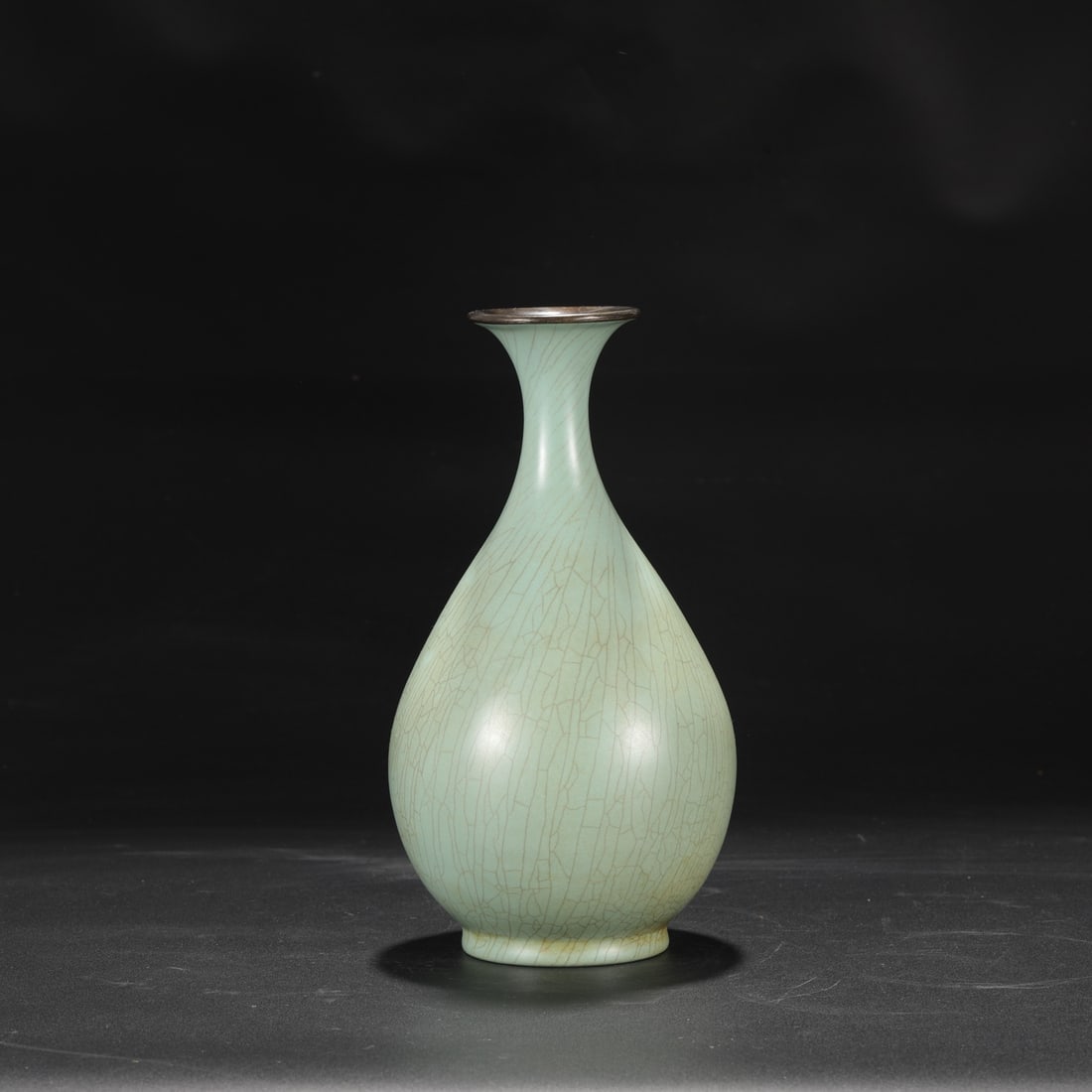 A large Ru ware celadon-glazed vase with a silver rim, formerly in the collection of the Northern: Dimensions: Height 27 cm, Mouth diameter 7 cm, Belly diameter 14 cm.