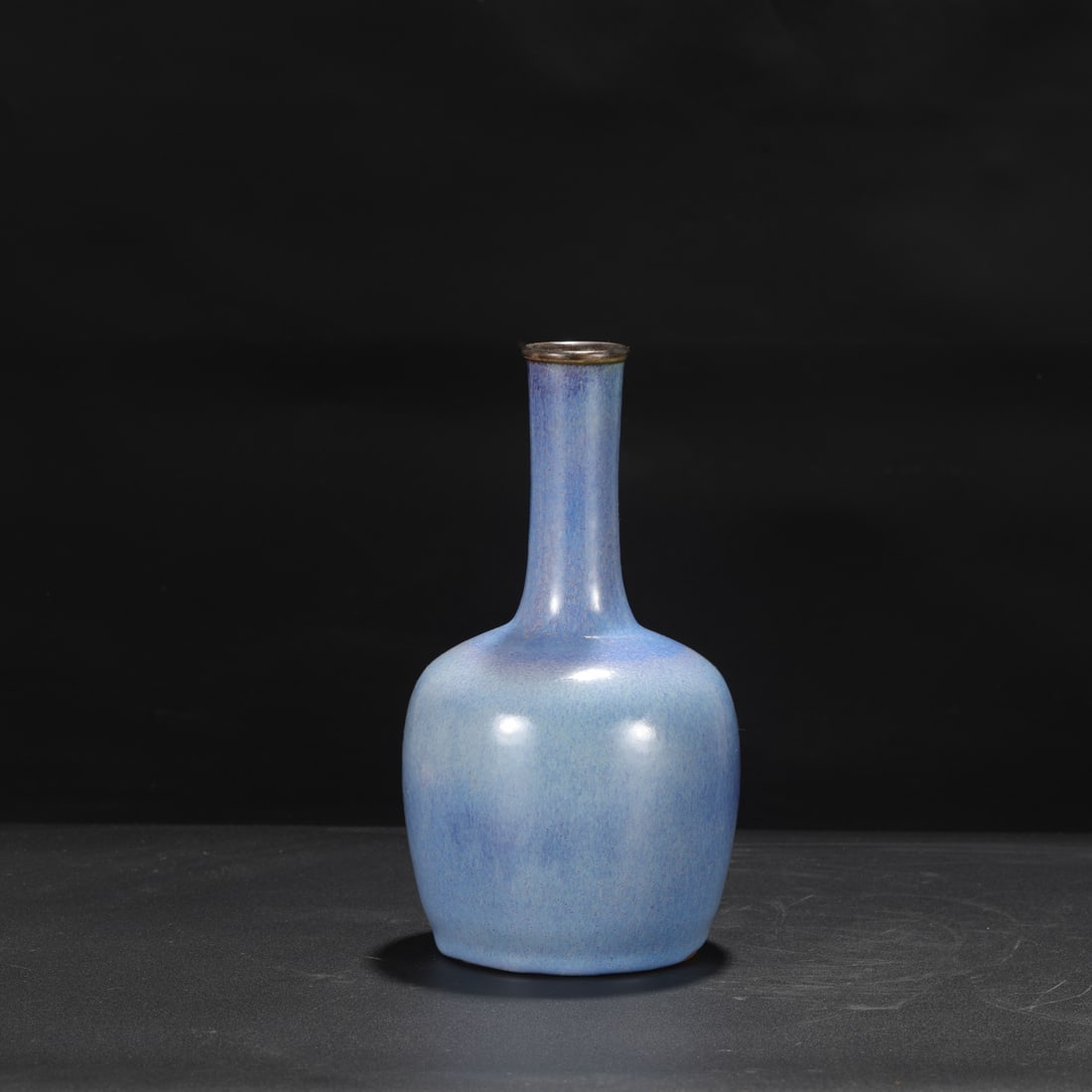 A Northern Song Dynasty Jun ware grape-purple glazed silver-rimmed imperial paper-carved vase from: Dimensions: Height 24 cm, Mouth diameter 4 cm, Belly diameter 12 cm.