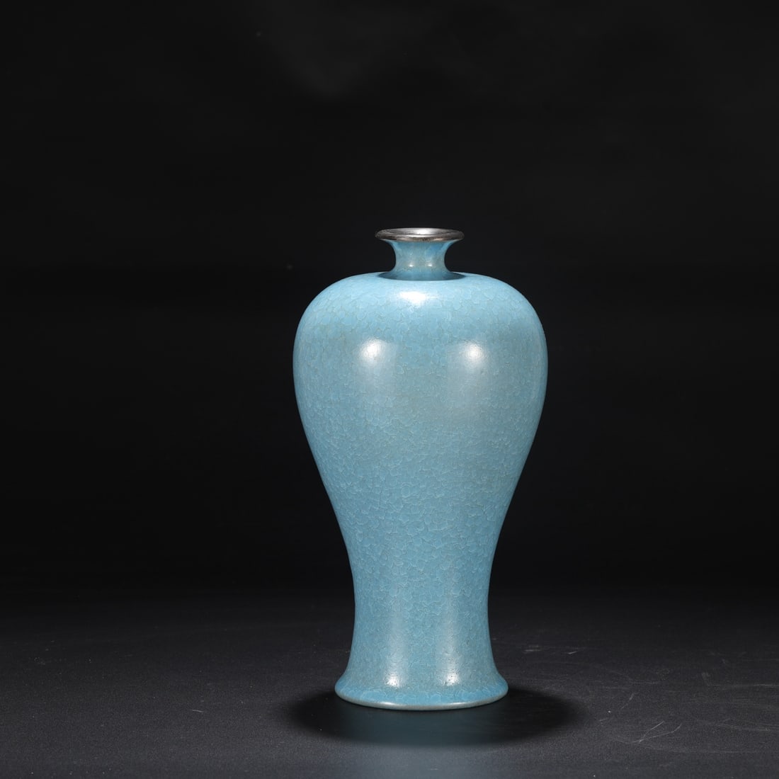 A large Northern Song Dynasty Ru ware vase with sky-blue glaze, ice-crack pattern, and silver rim,: Dimensions: Height 27.5 cm, Mouth diameter 5 cm, Belly diameter 13.5 cm.