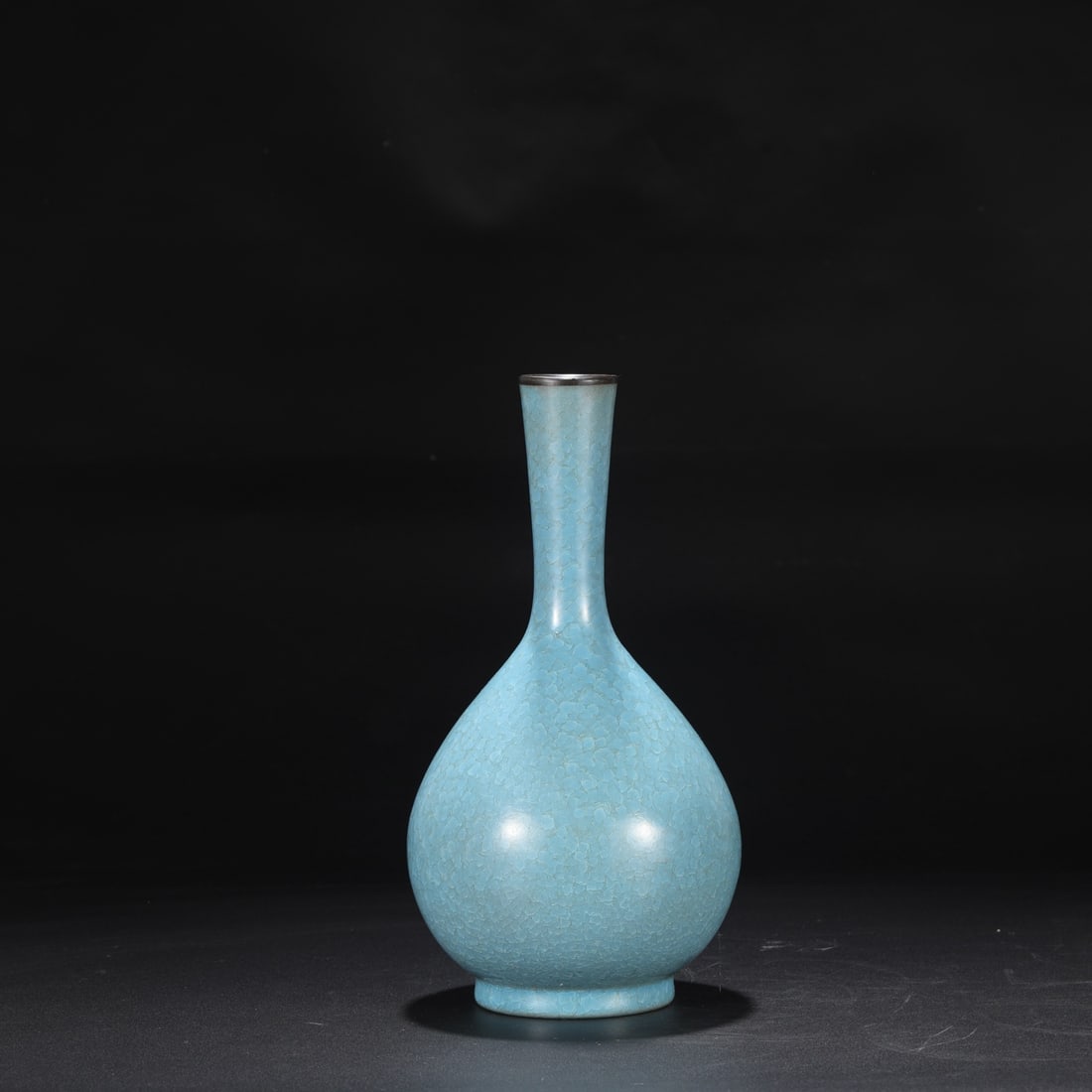 A Northern Song Dynasty Ru ware sky-blue glazed vase with ice-crack pattern and silver rim, formerly: Dimensions: Height 27 cm, Mouth diameter 4 cm, Belly diameter 13 cm.