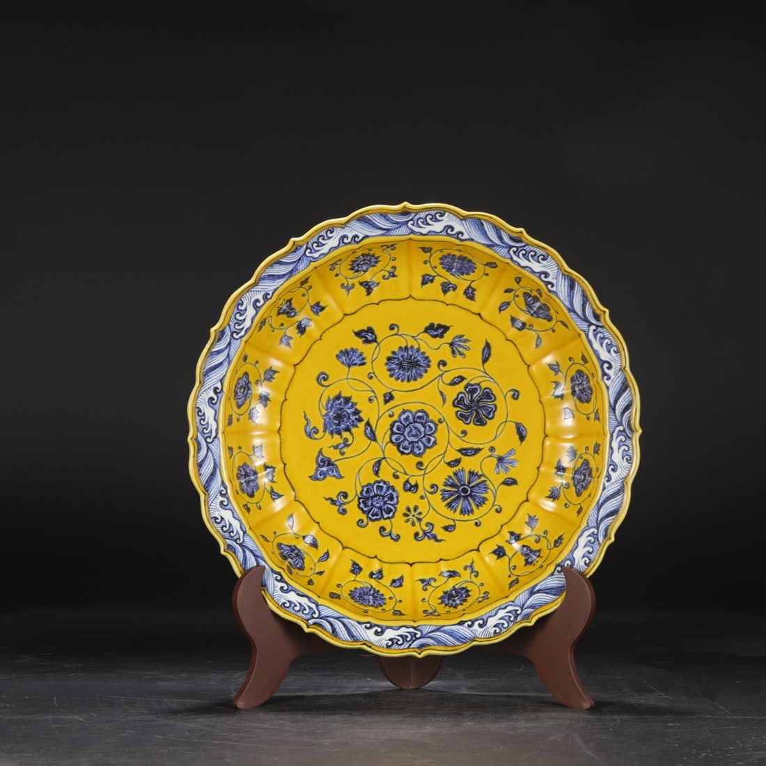 Formerly in the collection, a large Ming Dynasty Yongle period yellow-ground blue-and-white: Dimensions: Height 8 cm, Diameter 42 cm