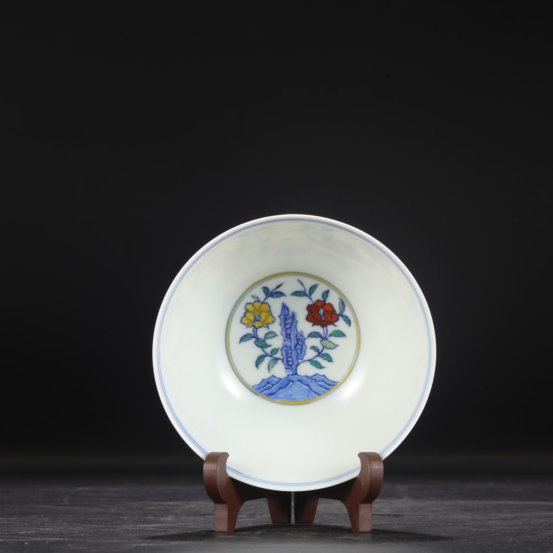 A Ming Dynasty Chenghua period doucai (enamel overglaze enamel) palace bowl with rock and floral: Dimensions: Height 7 cm, Diameter 15.5 cm.