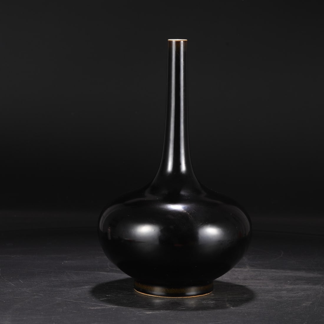 A Qing Dynasty Kangxi period black-glazed bold vase, formerly in the collection. (1 of 7)