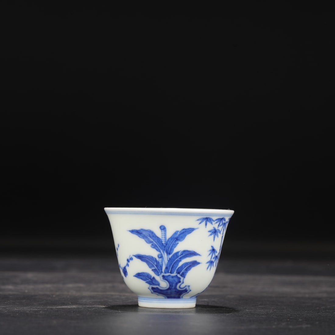 A Ming Dynasty Chenghua blue and white porcelain bell-shaped cup with pine, bamboo, and plum blossom (1 of 6)
