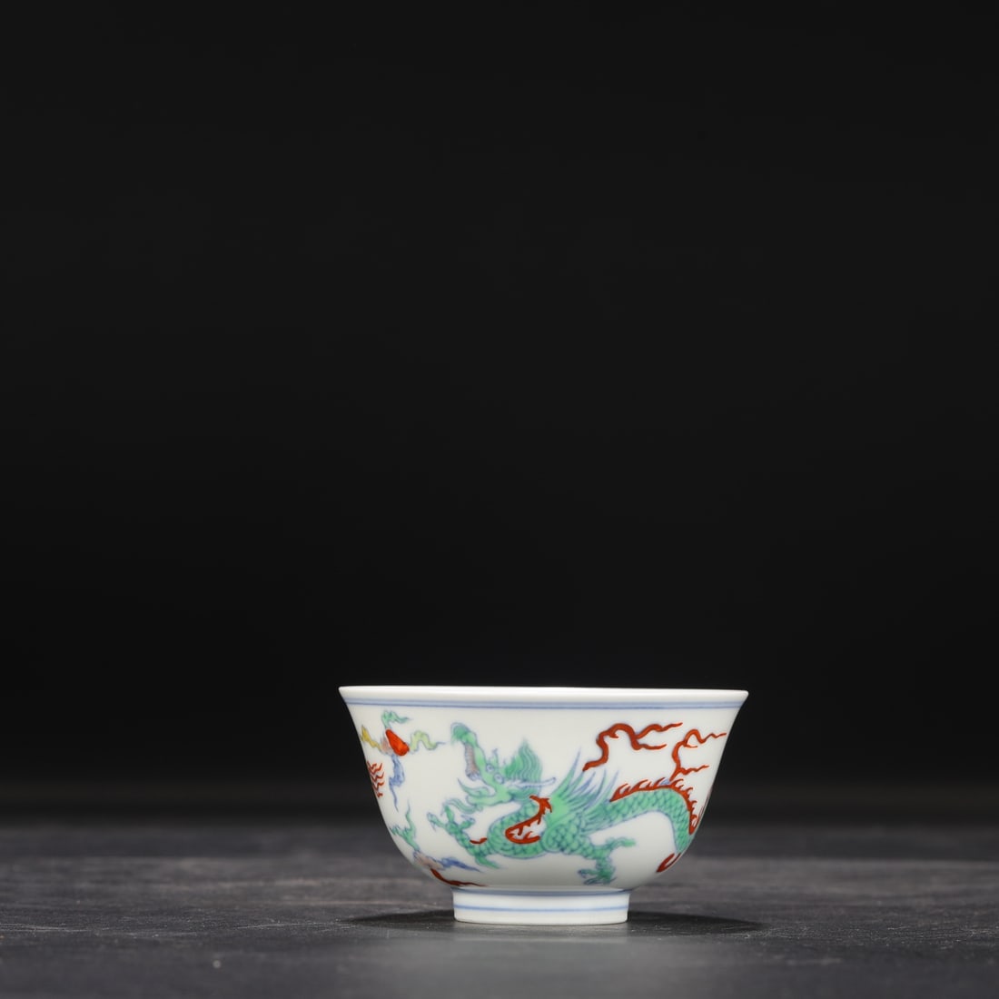 A Ming Dynasty Chenghua Doucai (enamel overglaze) cup with dragon and cloud design, formerly in the: Dimensions: Height 5 cm, Mouth Diameter 9 cm