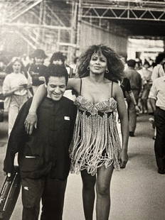 Peter Lindbergh "Azzedine Alaia & Tina Turner" Print.: Peter Lindbergh (1944-2019) was a German fashion photographer known for his influential and iconic work in the fashion industry. He was born on November 23, 1944, in Leszno, Poland, and grew up in Ger