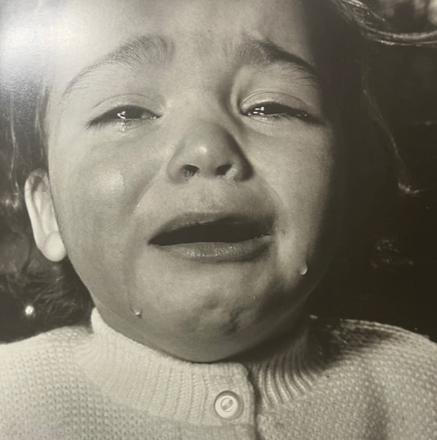 Diane Arbus "Child Crying" Print.: Diane Arbus (1923-1971) was an American photographer known for her compelling and often controversial portraits of people on the fringes of society. She was born on March 14, 1923, in New York City. A