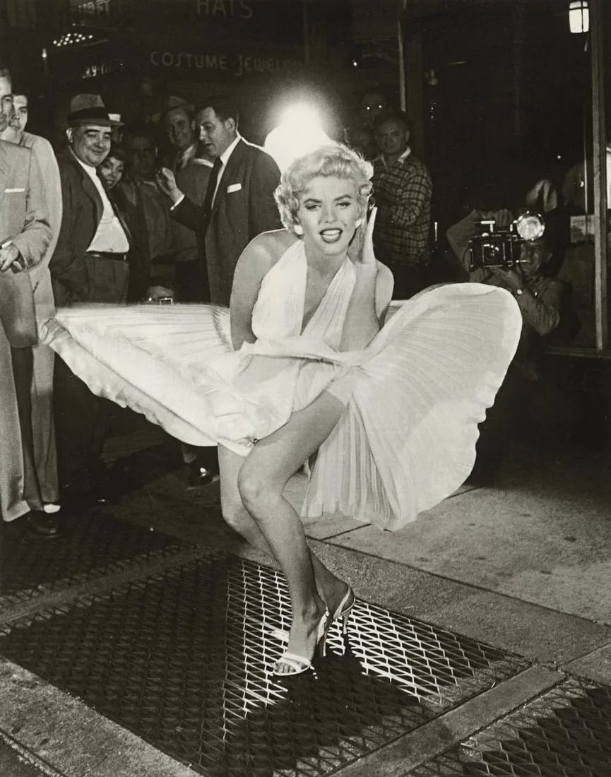 SAM SHAW "Marilyn Monroe, "Seven Year Itch", 1954" Print: Sam Shaw was an American photographer known for capturing some of the most iconic and candid moments in the world of cinema and celebrity. The reference to "Marilyn Monroe, 'Seven Year Itch,' 1954" li