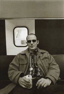 ANNIE LEIBOVITZ "Hunter S. Thompson, Dulles, 1972" Print: Annie Leibovitz is a highly influential American photographer known for her work in portrait and celebrity photography. "Hunter S. Thompson, Dulles, 1972" is a reference to one of her portraits featur