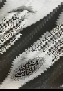 SHIRIN NESHAT "Untitled, 1996" Print: Shirin Neshat, an Iranian artist and photographer, is known for her distinctive work that often explores themes related to gender, identity, and politics, particularly within the context of Iranian an
