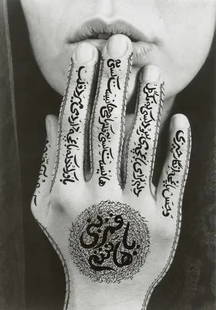 SHIRIN NESHAT "Untitled, 1996" Print: Shirin Neshat, an Iranian artist and photographer, is known for her distinctive work that often explores themes related to gender, identity, and politics, particularly within the context of Iranian an