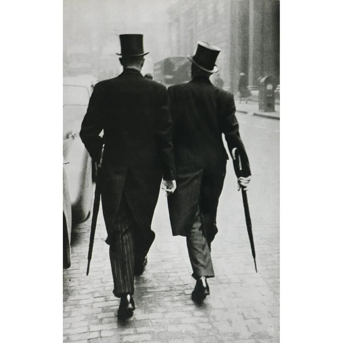 ROBERT FRANK "Gentlemen in Top Hats, London"Print: Robert Frank was a Swiss-American photographer and filmmaker known for his groundbreaking and influential work in the realms of documentary photography and filmmaking. He was born on November 9, 1924,