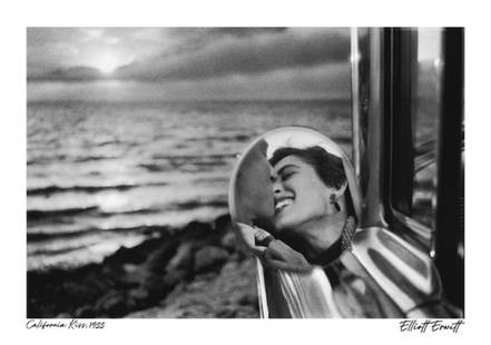 Elliott Erwitt "California Kiss, 1955" Print: Elliott Erwitt (born July 26, 1928) is an American photographer known for his candid and often humorous images of everyday life. He has had a prolific career spanning several decades, and his photogra