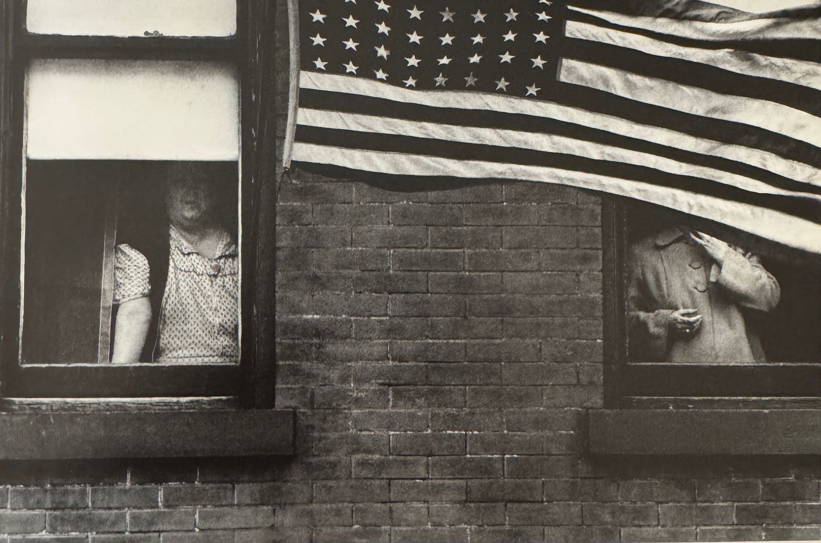 Robert Frank "Parade, Hoboken, New Jersey" Print: Robert Frank (1924–2019) was a Swiss-American photographer and filmmaker, best known for his groundbreaking book "The Americans." Born on November 9, 1924, in Zurich, Switzerland, Frank became one o