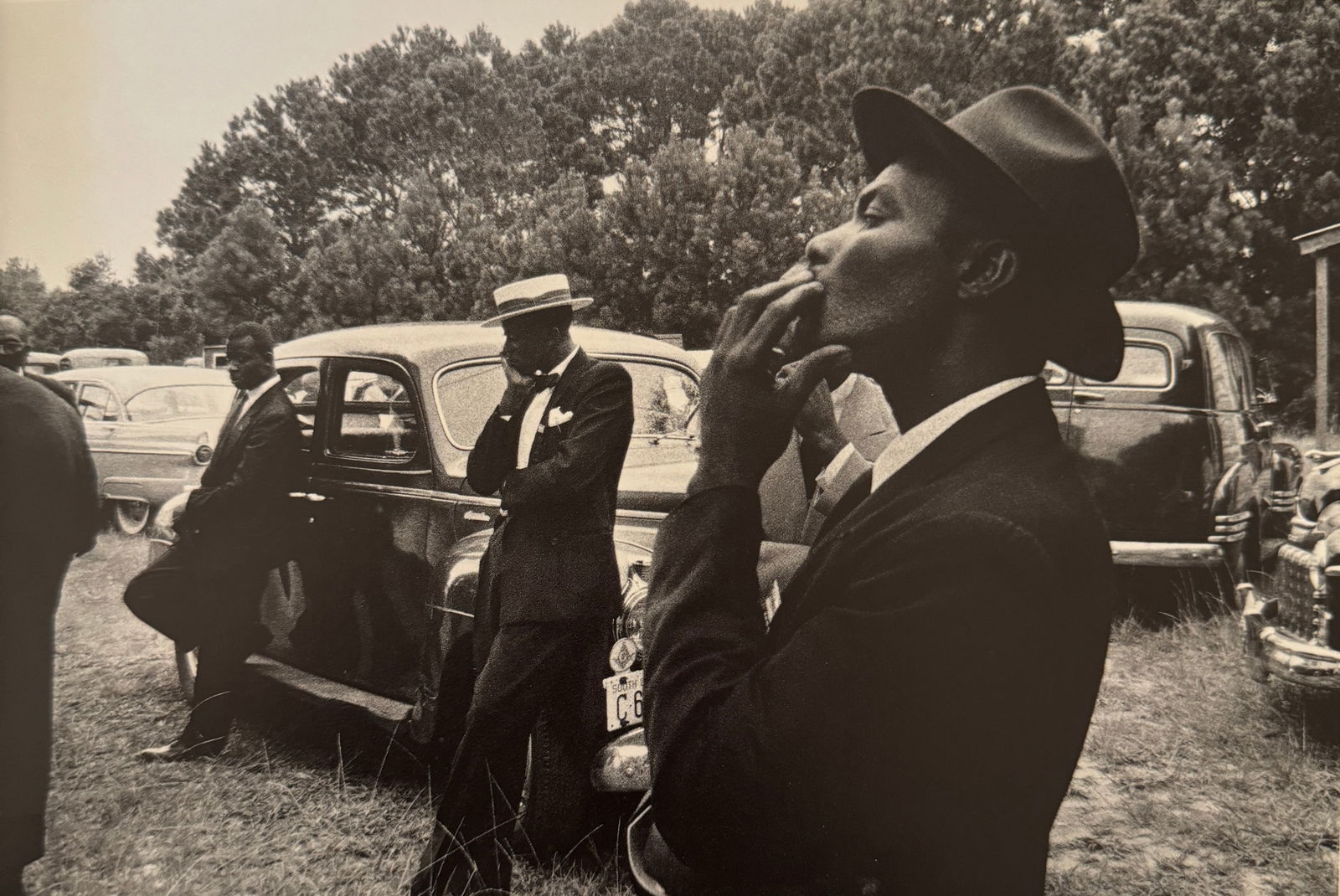 Robert Frank "Funeral, St Helena, South Carolina" Print: Robert Frank (1924–2019) was a Swiss-American photographer and filmmaker, best known for his groundbreaking book "The Americans." Born on November 9, 1924, in Zurich, Switzerland, Frank became one o