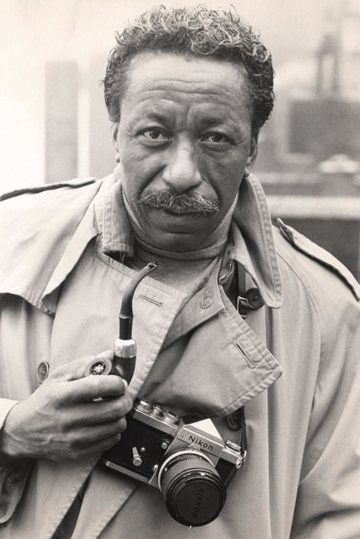 Gordon Parks "Nikon Camera" Print: Gordon Parks (1912–2006) was a highly influential American photographer, filmmaker, writer, and composer known for his groundbreaking work in documentary photography and as the first African America