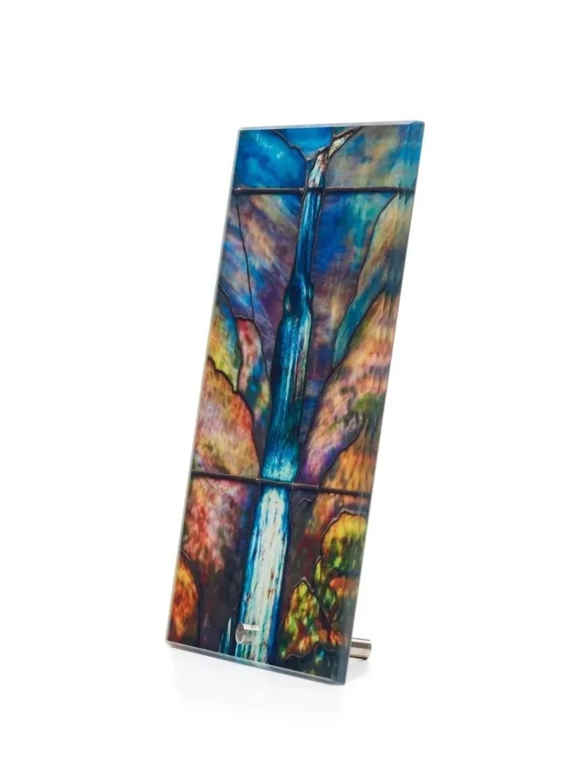 Tiffany Memorial Glass Panel: Tiffany Studios was a renowned American decorative arts firm known for its production of stained glass windows, lamps, and other decorative objects. It was founded by Louis Comfort Tiffany in 1902 and