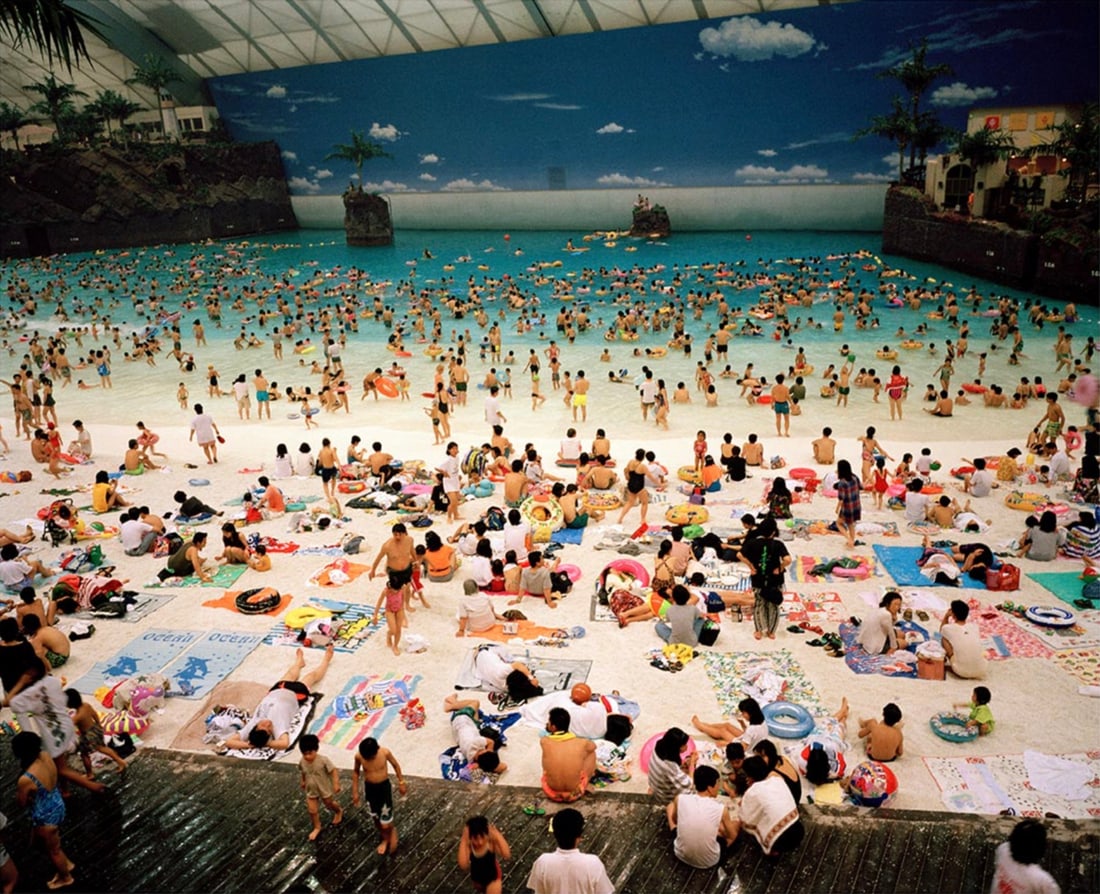Martin Parr "Ocean Dome, Miyazaki, Japan, 1996" Photo Print: Martin Parr is a British documentary photographer, born on May 23, 1952, in Epsom, Surrey, England. He is widely recognized for his satirical and humorous approach to documenting everyday life and con