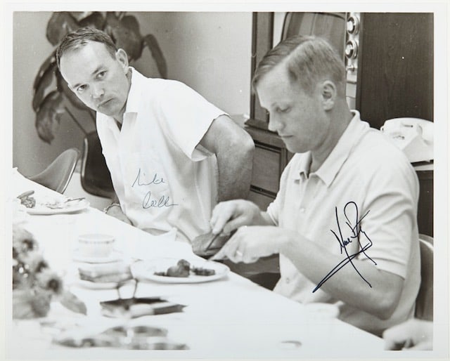 ARMSTRONG, Neil  and COLLINS, Michael.  Photograph signed.  Kennedy Space Center, 16 July 1969. (1 of 1)