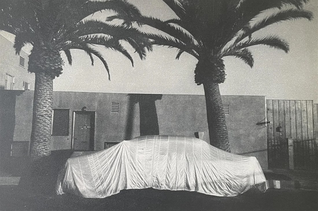 Robert Frank “Covered Car, Long Beach, California" Print: Robert Frank, born in Switzerland in 1924, was a seminal figure in 20th-century photography, best known for his influential book "The Americans." Emigrating to the United States in 1947, Frank initial