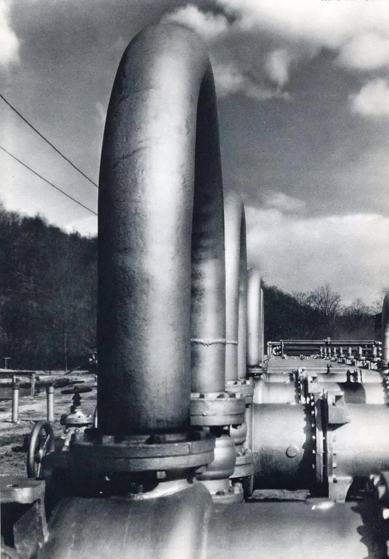 Margaret Bourke-White "Compressor Station Pipes": Measures: 8 1/2 x 11 1/2 inches print and mounted