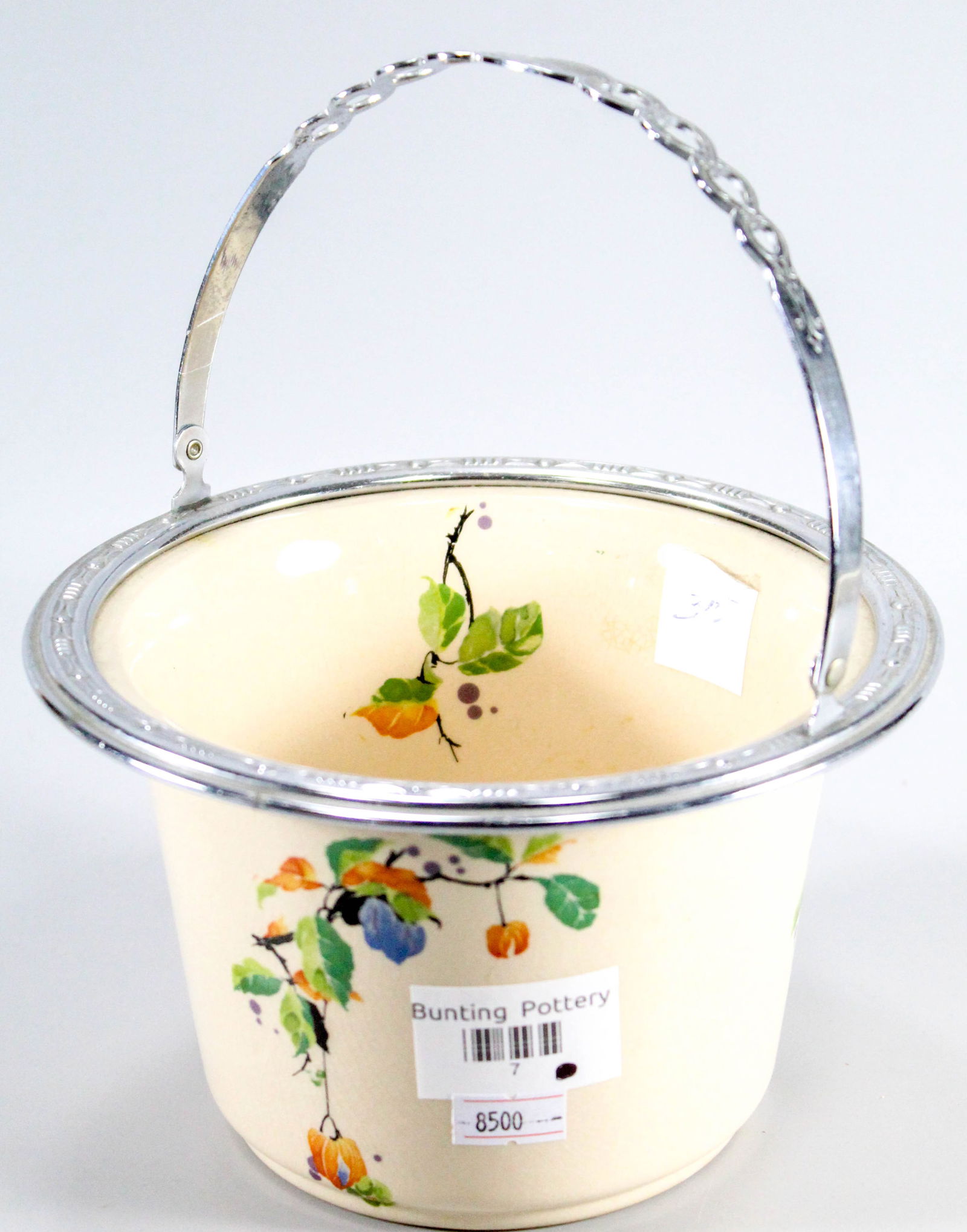 Umbertone made for Farberware ice bucket: Garden pattern ice bucket. Bottom marked "Umbertone Made for Faberware by Leigh Potters, INC USA"